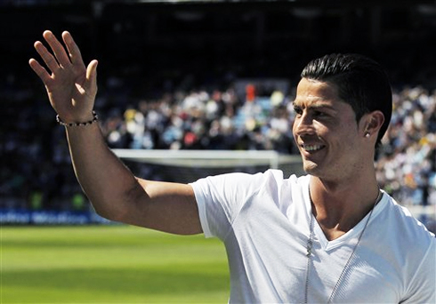 Cristiano Ronaldo receiving a prize at the Santiago Bernabéu