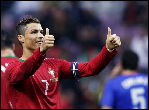 Cristiano Ronaldo putting his two thumbs up, after scoring his last goal of the season for Portugal