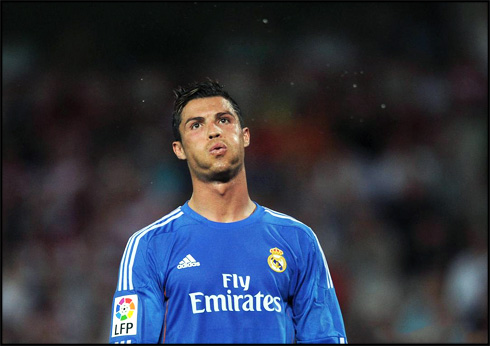 Cristiano Ronaldo whistling while wearing Real Madrid's new blue kit for 2013-2014