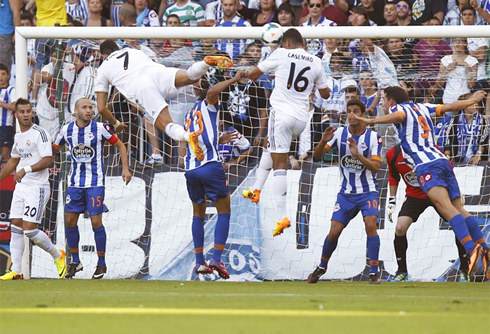 Cristiano Ronaldo flying over defenders, in Real Madrid 2013-2014