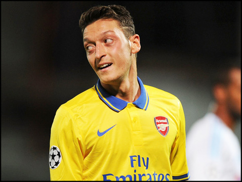 Mesut Ozil playing for Arsenal, in 2013-2014