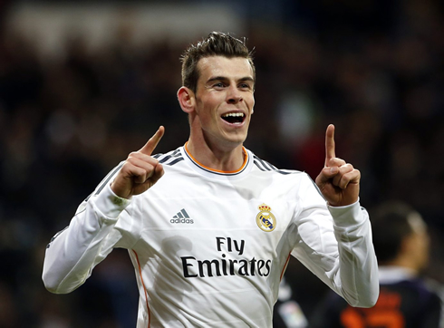 Gareth Bale sticking his two fingers up, after scoring for Real Madrid