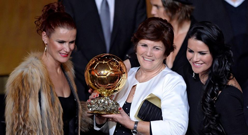 Cristiano Ronaldo family sisters and mother, showing off the FIFA Ballon d'Or 2013 trophy