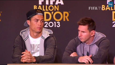 Cristiano Ronaldo giving Lionel Messi the killer look, at the FIFA Ballon d'Or 2013 press-conference