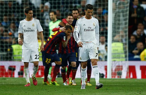 Cristiano Ronaldo with his head down after Barcelona scored against Real Madrid
