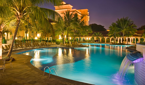 The Royal Palm Plaza Resort in Campinas Brazil, with its pool enlightened