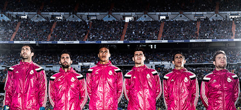 Real Madrid players wearing the pink team jacket for 2014-2015