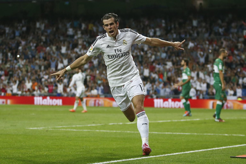 Gareth Bale stretching his arms wide to celebrate Real Madrid goal