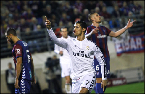 Cristiano Ronaldo raising a finger from his right hand, after scoring for Real Madrid