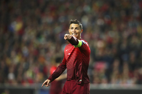 Cristiano Ronaldo pointing to a teammate in a Portugal National Team fixture in 2015