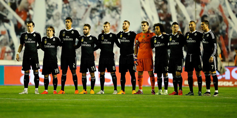 Real Madrid players respecting a minute of silence