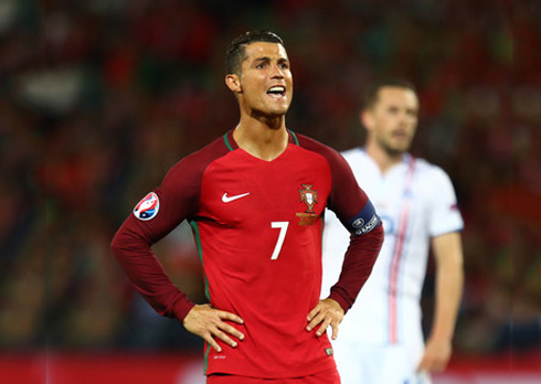 Cristiano Ronaldo putting his hands around his waist in the EURO 2016