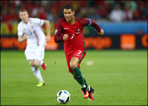 Cristiano Ronaldo running in a game for Portugal in the EURO 2016