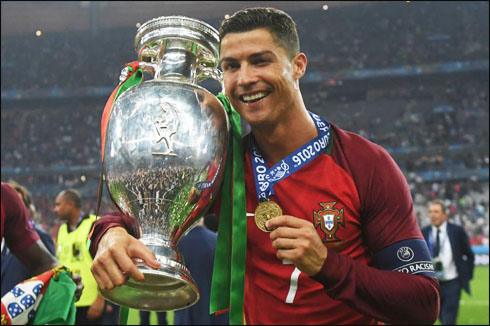 Ronaldo holding the EURO 2016 trophy