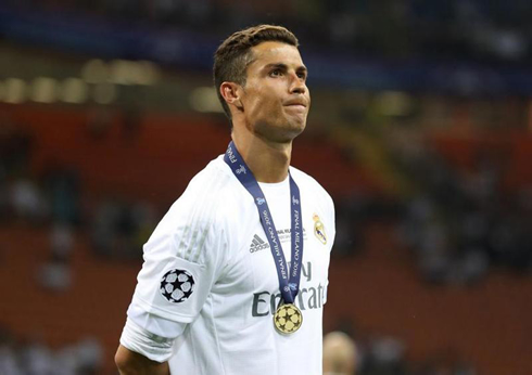 Cristiano Ronaldo with Champions League medal around his neck