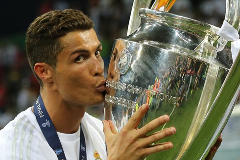 Cristiano Ronaldo kissing the Champions League trophy