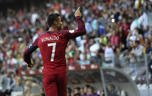 Cristiano Ronaldo turns to the fans to celebrate Portugal goal against the Faroe Islands
