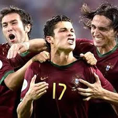 Cristiano Ronaldo celebrating a goal for Portugal, with Hugo Viana and Fernando Meira