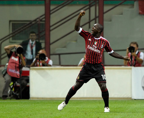 Seedorf wearing the new AC Milan kit and celebrating a goal match against Juventus