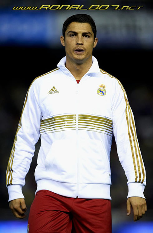 Cristiano Ronaldo in the new Real Madrid training kit (white jacket with golden stripes), for 2011-2012