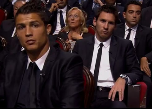 Cristiano Ronaldo, Messi and Xavi standing in FIFA gala ceremony