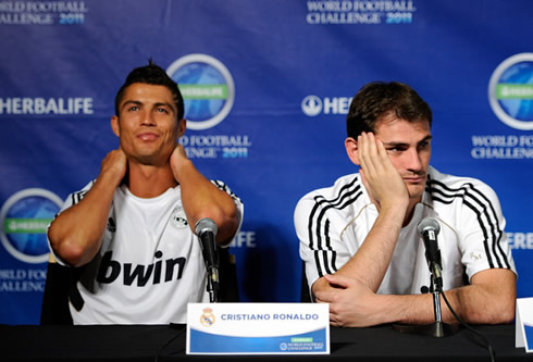Cristiano Ronaldo and Iker Casillas looking tired and bored in a Real Madrid press conference in the United States