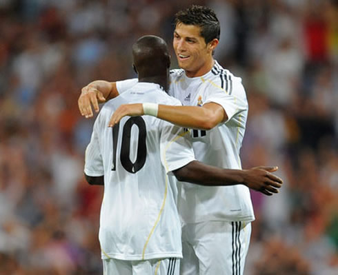 Cristiano Ronaldo hugging Lass Diarra when celebrating a goal for Real Madrid