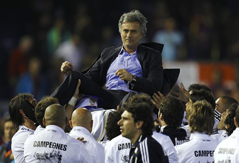 José Mourinho a Real Madrid hero, and being raised in the air by his players, after winning the Copa del Rey in 2011