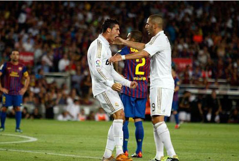 Cristiano Ronaldo scores vs Barcelona and celebrates with Benzema