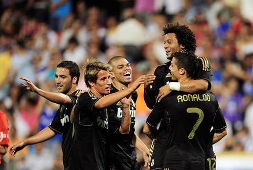 Cristiano Ronaldo celebrating with Fábio Coentrão, Pepe and Marcelo