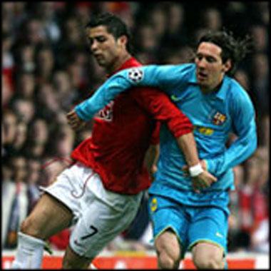 Messi and Cristiano Ronaldo fighting for the ball in Manchester United vs Barcelona