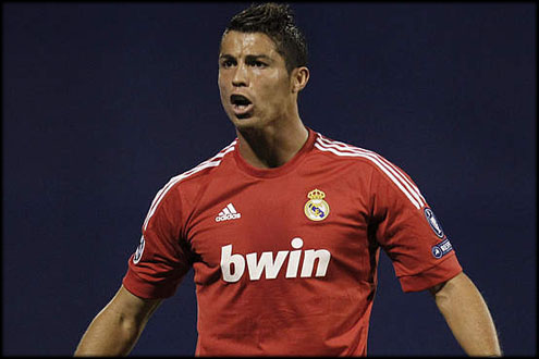 Cristiano Ronaldo wearing the new Real Madrid red jersey 2011-12, in the UEFA Champions League