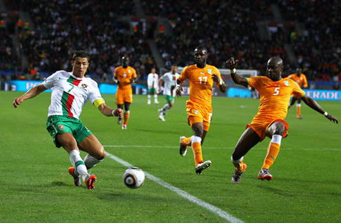 Cristiano Ronaldo goes down the line to get a cross in World Cup's match between Portugal and Ivory Coast