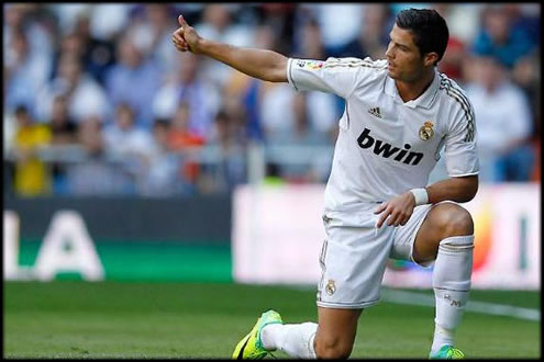 Cristiano Ronaldo shows thumbs up for a teammate in Real Madrid against Betis, in La Liga 2011/12