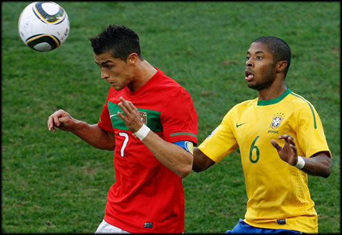 Cristiano Ronaldo Michel Bastos playing in the match Portugal vs Brazil, in the South Africa 2010 World Cup