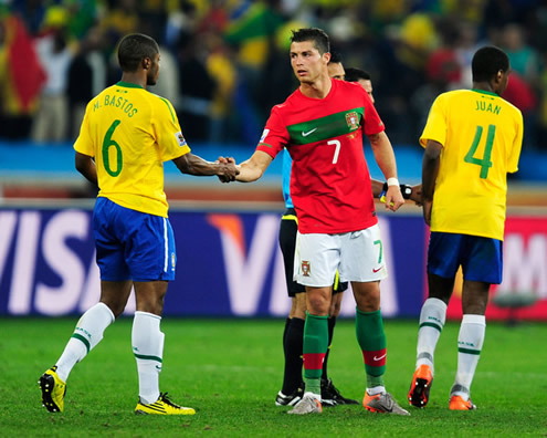 Michel Bastos greeting Cristiano Ronaldo after a World Cup match between Portugal and Brazil