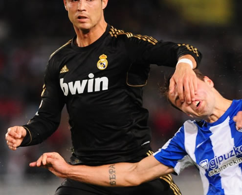 Cristiano Ronaldo eye pokes (puts his fingers on a defender's eyes/face)