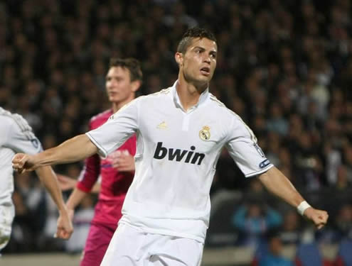 Cristiano Ronaldo clenches his fists after scoring his 100th goal for Real Madrid from a free-kick