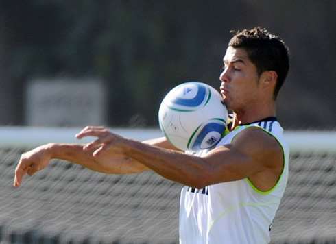 Cristiano Ronaldo training with a sleeveless Real Madrid shirt in 2011-2012