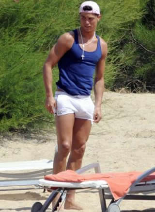 Cristiano Ronaldo fashion in the beach with blue sleeveless shirt