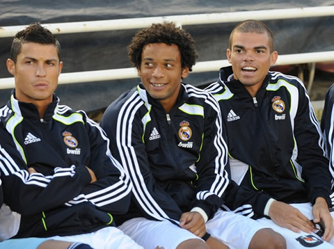 Cristiano Ronaldo sitted next to Marcelo on Real Madrid bench 2011-2012, while the Brazilian is laughing of something near him