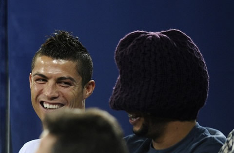 Cristiano Ronaldo having a laugh with Marcelo's jokes, this time covering his head with a bonnet/cap