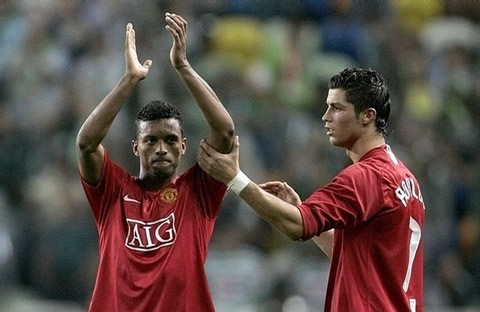 Nani clapping and Cristiano Ronaldo reaching over