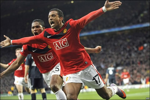Nani running to celebrate a goal with the fans, with Antonio Valencia running behind him in Manchester United 2011-2012 season