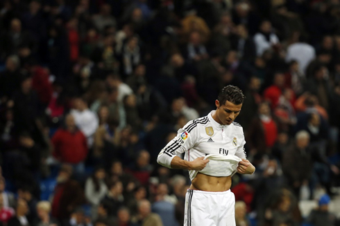Cristiano Ronaldo pulls his shirt up during a Real Madrid game in March of 2015