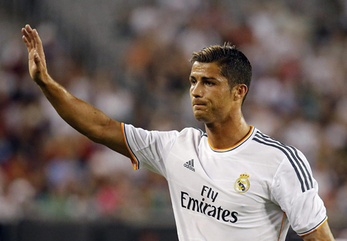 Cristiano Ronaldo raising the palm of his hand and looking humble, in LA Galaxy vs Real Madrid, in 2013-2014
