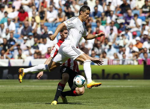 Cristiano Ronaldo being challenged by a Basque player in a Sunday morning game for Real Madrid in 2013-2014