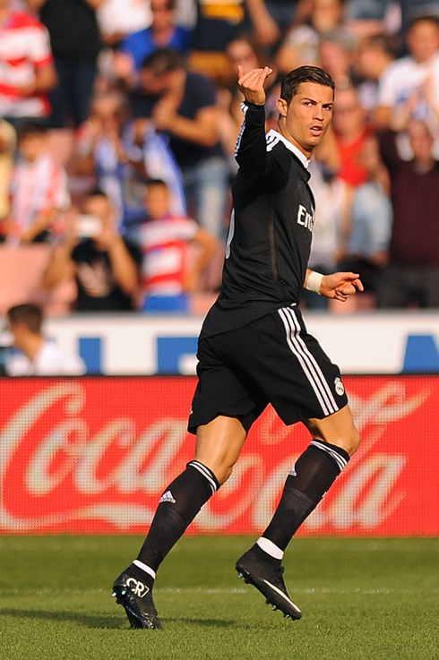 Cristiano Ronaldo calling his teammates to join him in his goal celebration in Granada