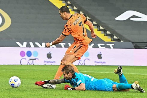 Cristiano Ronaldo dribbles the goalkeeper before scoring another goal