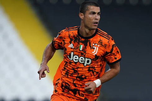 Cristiano Ronaldo wearing Juventus orange shirt